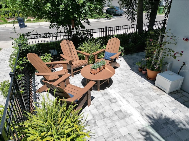 view of patio with fence