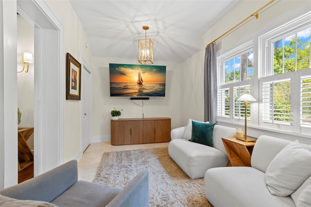 455 18th Ave NE, Saint Petersburg, FL 33704 - sitting room with a chandelier and baseboards