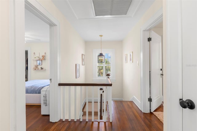 455 18th Ave NE, Saint Petersburg, FL 33704 - hallway featuring wood finished floors, an upstairs landing, and baseboards