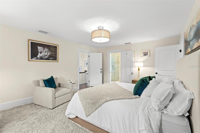 455 18th Ave NE, Saint Petersburg, FL 33704 - carpeted bedroom with baseboards
