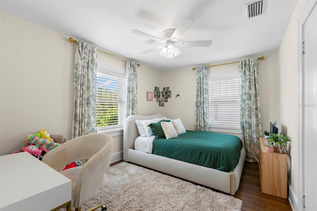 455 18th Ave NE, Saint Petersburg, FL 33704 - bedroom featuring wood finished floors and a ceiling fan