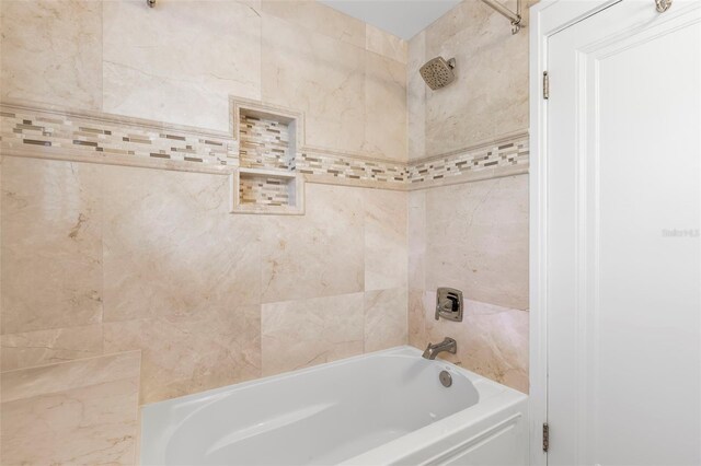 455 18th Ave NE, Saint Petersburg, FL 33704 - bathroom featuring shower / tub combination