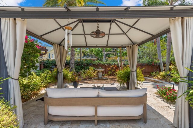 455 18th Ave NE, Saint Petersburg, FL 33704 - view of patio / terrace featuring a gazebo, fence, and an outdoor hangout area