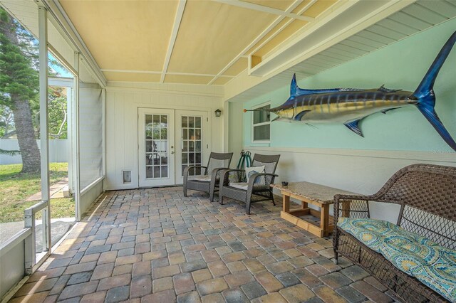 sunroom featuring french doors