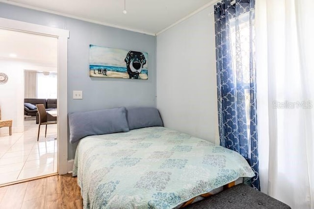 945 8th St N, Saint Petersburg, FL 33712 - bedroom featuring crown molding
