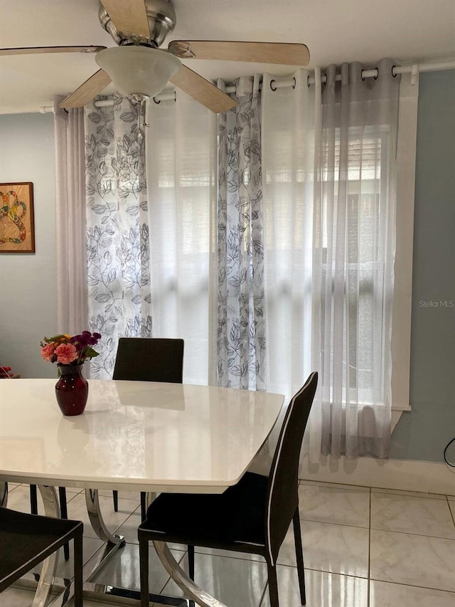 945 8th St N, Saint Petersburg, FL 33712 - tiled dining space with a ceiling fan
