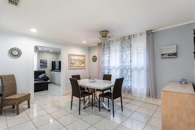 945 8th St N, Saint Petersburg, FL 33712 - dining area with crown molding, light tile patterned floors, recessed lighting, and a ceiling fan