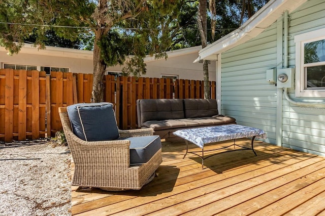 945 8th St N, Saint Petersburg, FL 33712 - wooden terrace featuring fence and an outdoor hangout area