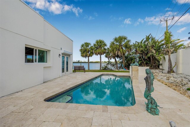 321 N Blvd Of The Presidents, Sarasota, FL 34236 - view of pool with a patio, a water view, and a fenced backyard