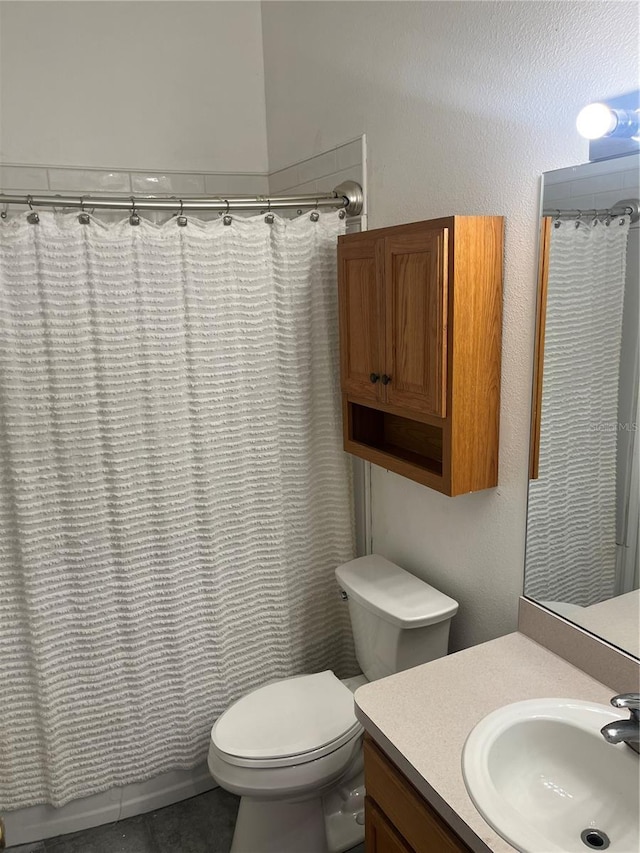 bathroom featuring toilet, vanity, and shower / bathtub combination with curtain
