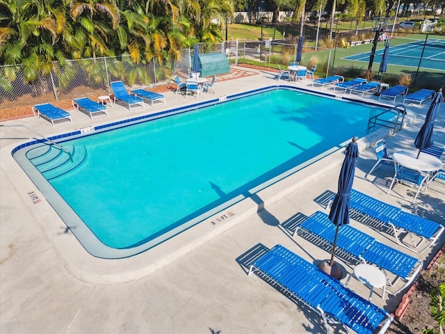 5729 Calais Blvd N Unit 6, Saint Petersburg, FL 33714 - community pool with fence and a patio area