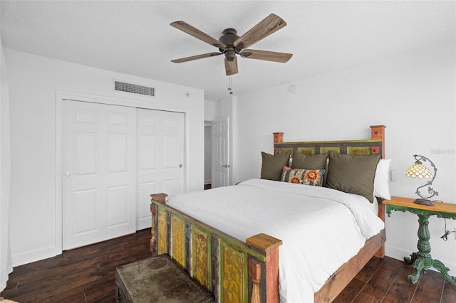 bedroom featuring hardwood / wood-style floors, a closet, and ceiling fan