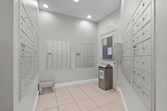view of property's community featuring mail area and recessed lighting
