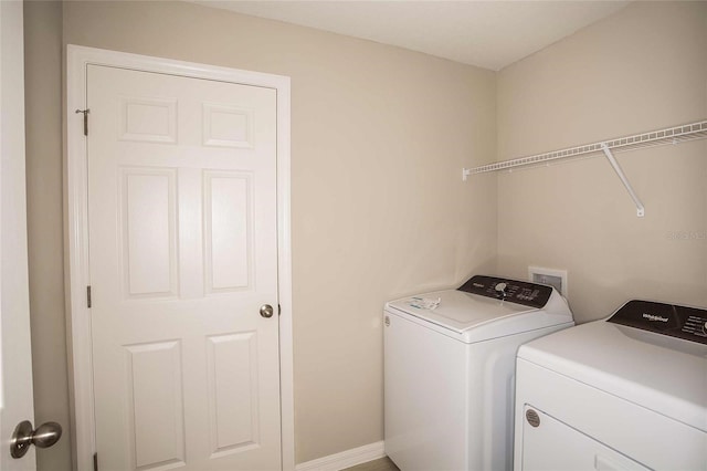 1205 Tidal St, Haines City, FL 33844 - clothes washing area featuring washer and clothes dryer
