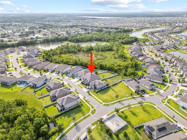 31643 Colada Drift Way, Wesley Chapel, FL 33545 - aerial view of residential area with a large body of water