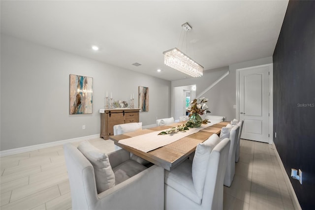 31643 Colada Drift Way, Wesley Chapel, FL 33545 - dining area featuring baseboards, recessed lighting, and a chandelier