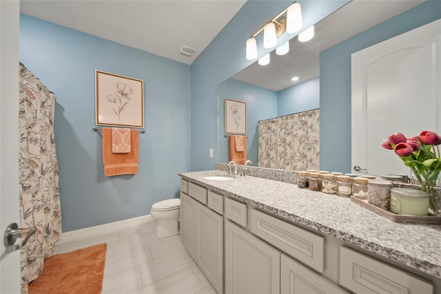 31643 Colada Drift Way, Wesley Chapel, FL 33545 - bathroom with vanity, toilet, curtained shower, tile patterned flooring, and baseboards