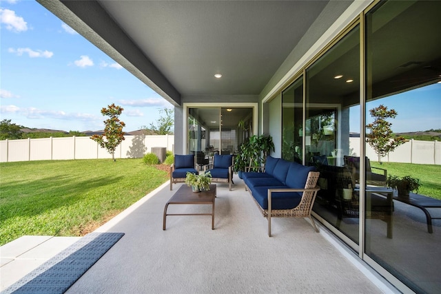 31643 Colada Drift Way, Wesley Chapel, FL 33545 - view of patio with outdoor lounge area and central AC