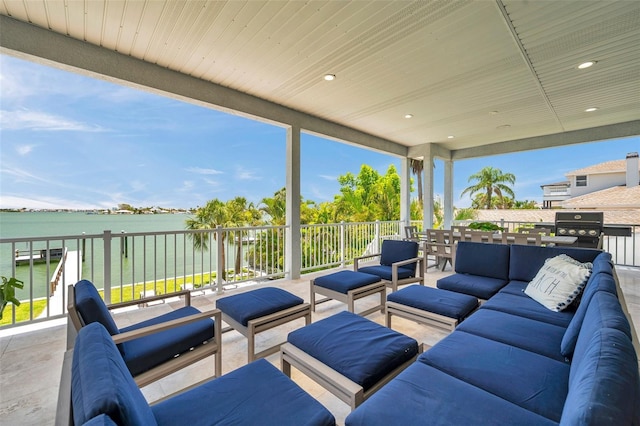 7115 Bay St, St Pete Beach, FL 33706 - view of patio featuring an outdoor living space and a water view