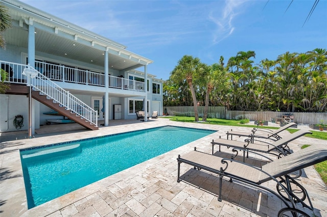 7115 Bay St, St Pete Beach, FL 33706 - view of pool with a patio and stairs