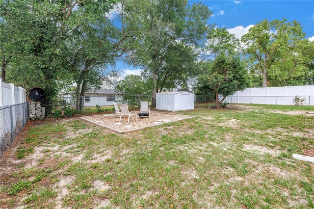 2270 Amherst Ave, Spring Hill, FL 34609 - fenced backyard with a storage unit and an outdoor structure