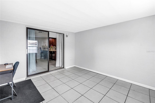 2270 Amherst Ave, Spring Hill, FL 34609 - unfurnished room featuring light tile patterned floors and baseboards