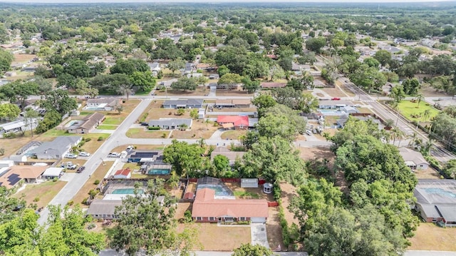 aerial view of property's location with nearby suburban area