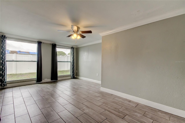 9120 Lunar Ln, Port Richey, FL 34668 - empty room with ceiling fan, crown molding, baseboards, and wood finished floors