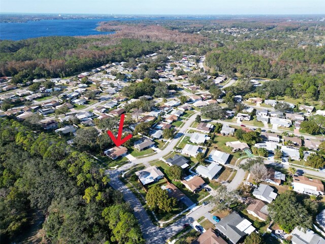 700 Bowsprit Pl, Palm Harbor, FL 34685 - aerial view of property and surrounding area with a forest and nearby suburban area