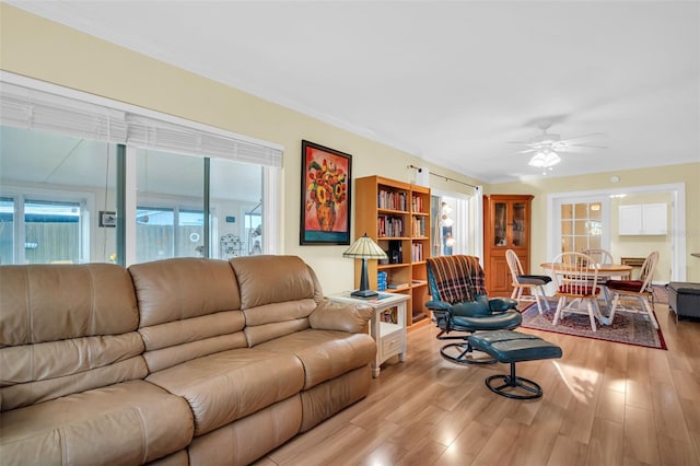 700 Bowsprit Pl, Palm Harbor, FL 34685 - living area with light wood-type flooring and a ceiling fan