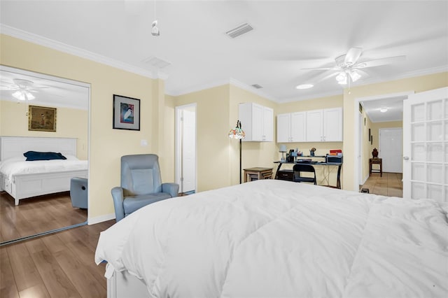 700 Bowsprit Pl, Palm Harbor, FL 34685 - bedroom featuring wood finished floors, ornamental molding, baseboards, and ceiling fan
