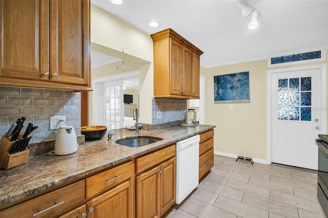 700 Bowsprit Pl, Palm Harbor, FL 34685 - kitchen with dishwasher, light stone countertops, crown molding, a sink, and decorative backsplash