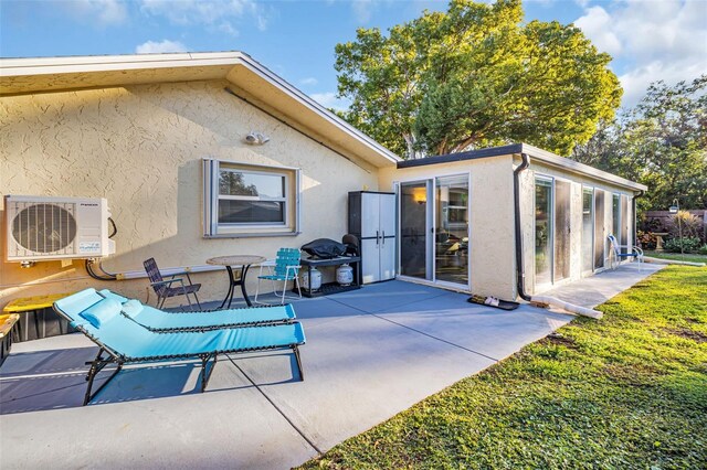 700 Bowsprit Pl, Palm Harbor, FL 34685 - view of patio / terrace featuring ac unit and a grill
