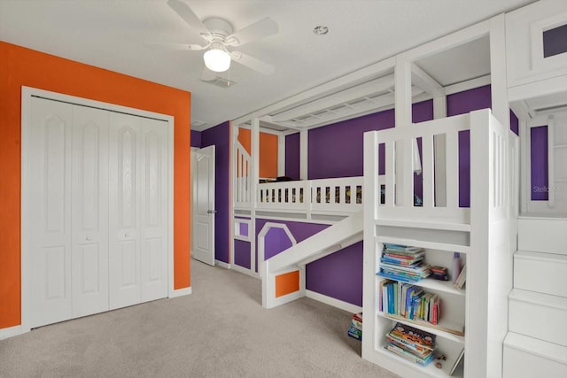 10106 Count Fleet Dr, Ruskin, FL 33575 - unfurnished bedroom with carpet floors, a closet, baseboards, and a ceiling fan