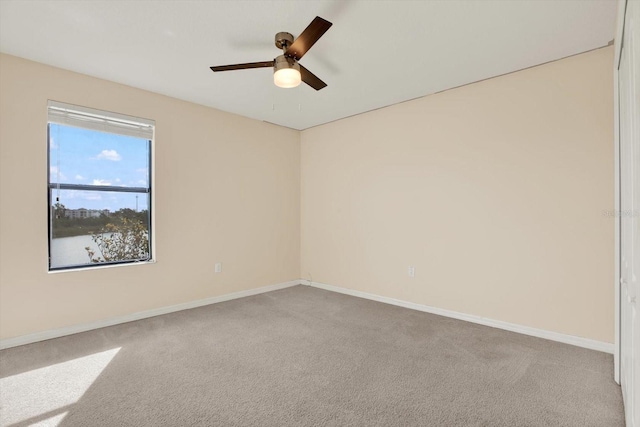10106 Count Fleet Dr, Ruskin, FL 33575 - carpeted empty room with ceiling fan and baseboards