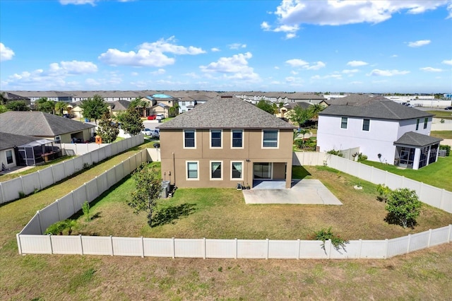 10106 Count Fleet Dr, Ruskin, FL 33575 - view of front facade featuring a residential view, stucco siding, a patio area, and a shingled roof