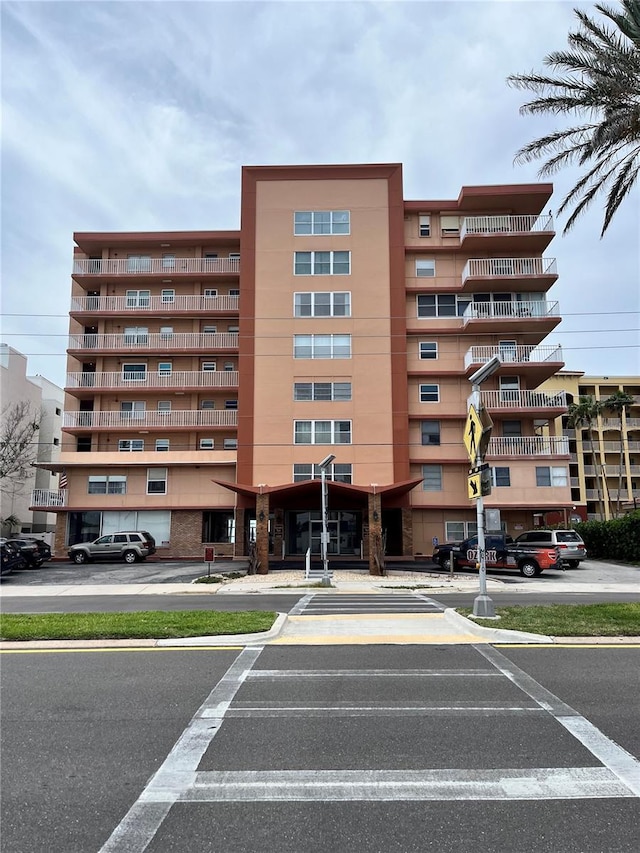 16400 Gulf Blvd Unit 307, North Redington Beach, FL 33708 - view of apartment building / complex featuring uncovered parking