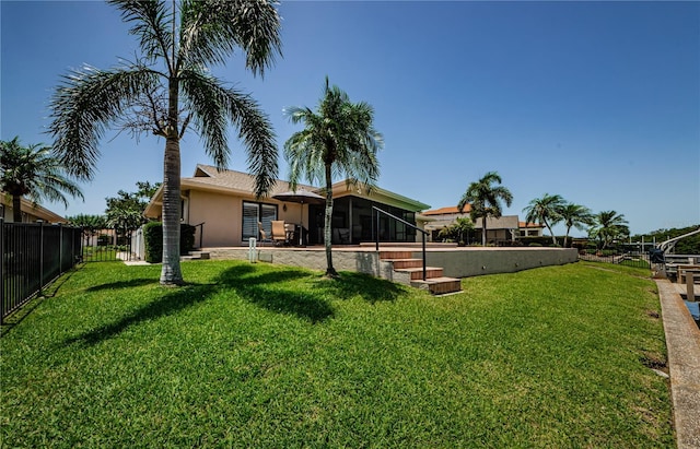 671 Tallahassee Dr NE, Saint Petersburg, FL 33702 - view of yard featuring a sunroom