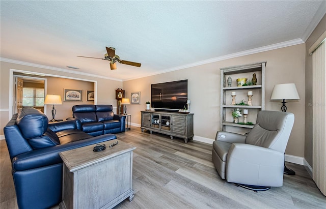 671 Tallahassee Dr NE, Saint Petersburg, FL 33702 - living room featuring ceiling fan, light wood-style floors, crown molding, baseboards, and a textured ceiling