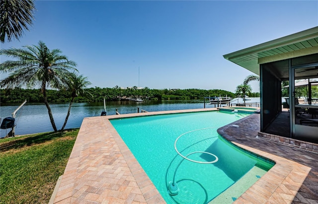 671 Tallahassee Dr NE, Saint Petersburg, FL 33702 - view of swimming pool featuring a water view, a pool with connected hot tub, a sunroom, and a boat dock