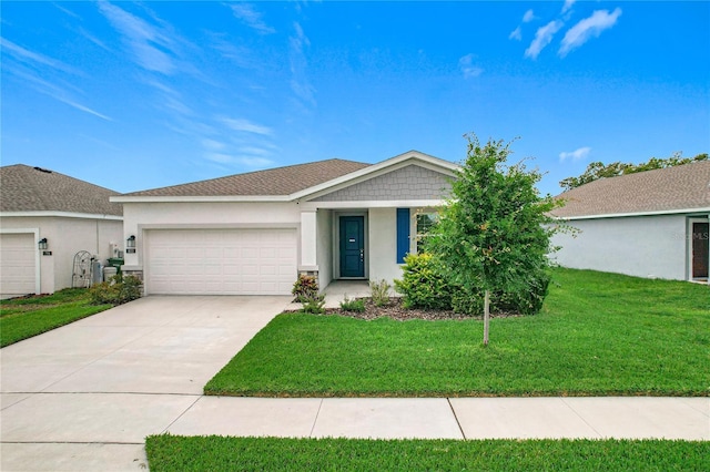 800 Reggie Rd, Winter Haven, FL 33884 - single story home with a garage, stucco siding, concrete driveway, and a front lawn