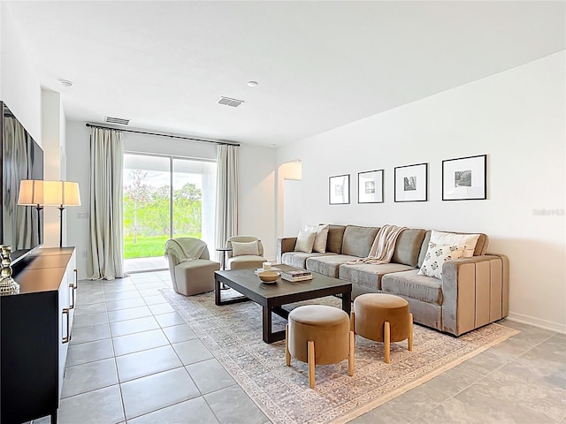 800 Reggie Rd, Winter Haven, FL 33884 - living room with light tile patterned floors