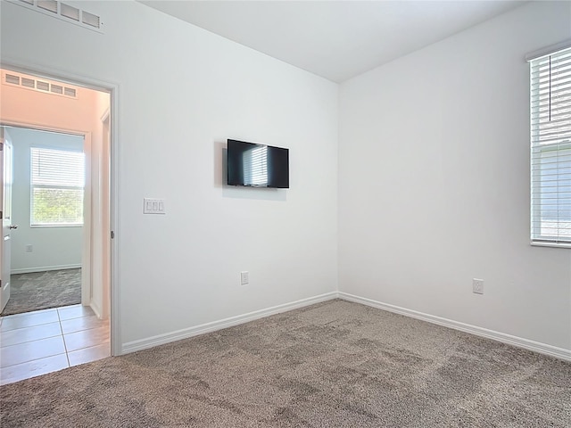800 Reggie Rd, Winter Haven, FL 33884 - spare room with light colored carpet and baseboards
