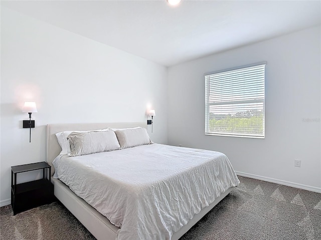 800 Reggie Rd, Winter Haven, FL 33884 - carpeted bedroom featuring baseboards