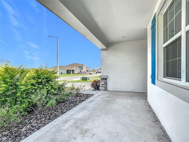 800 Reggie Rd, Winter Haven, FL 33884 - view of patio / terrace featuring a residential view