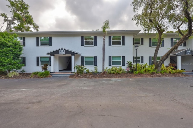 13125 Wilcox Rd Unit 16202, Largo, FL 33774 - view of property with stucco siding