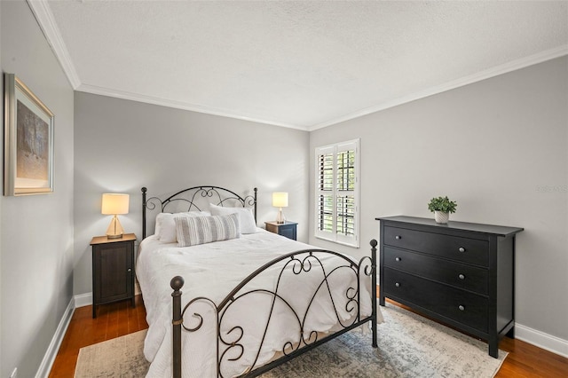 3922 Cedar Cay Cir, Valrico, FL 33596 - bedroom with wood finished floors, ornamental molding, and baseboards