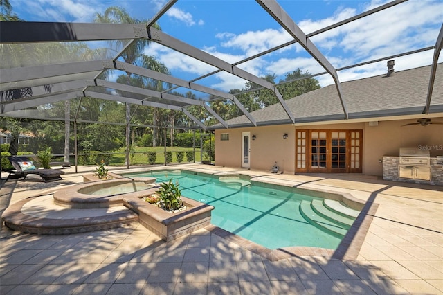 3922 Cedar Cay Cir, Valrico, FL 33596 - outdoor pool featuring an in-ground hot tub, an outdoor kitchen, a patio, french doors, and glass enclosure