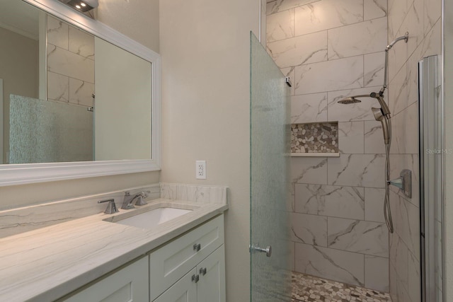 632 S Florida Ave, Tarpon Springs, FL 34689 - full bathroom featuring a tile shower and vanity