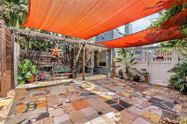 536 Ave G SE, Winter Haven, FL 33880 - view of patio / terrace featuring a gate